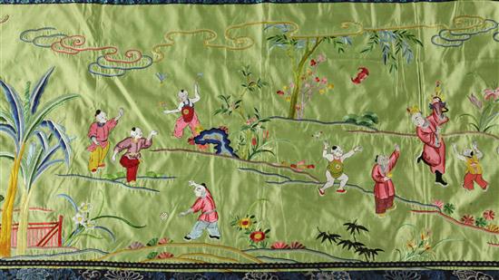 A Chinese embroidered silk wall hanging, early 20th century, 256 x 57cm